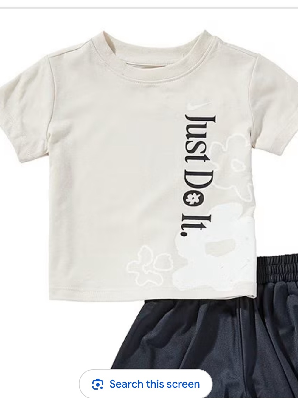 Nike Cream Short Sleeve Tee with Vertical 'Just Do It.' And flowers. Like new!